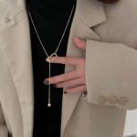 European Style Snake Chain Pendant Necklace for Women – Trendy Pull Ball Design, Creative High-End Jewelry - Image 2