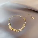 Golden Leaf Pearl Jewellery Set – 4 Pieces (Necklace, Bracelet, Earrings, Pearl Chain) - Image 5