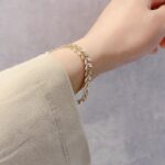 Golden Leaf Pearl Jewellery Set – 4 Pieces (Necklace, Bracelet, Earrings, Pearl Chain) - Image 6