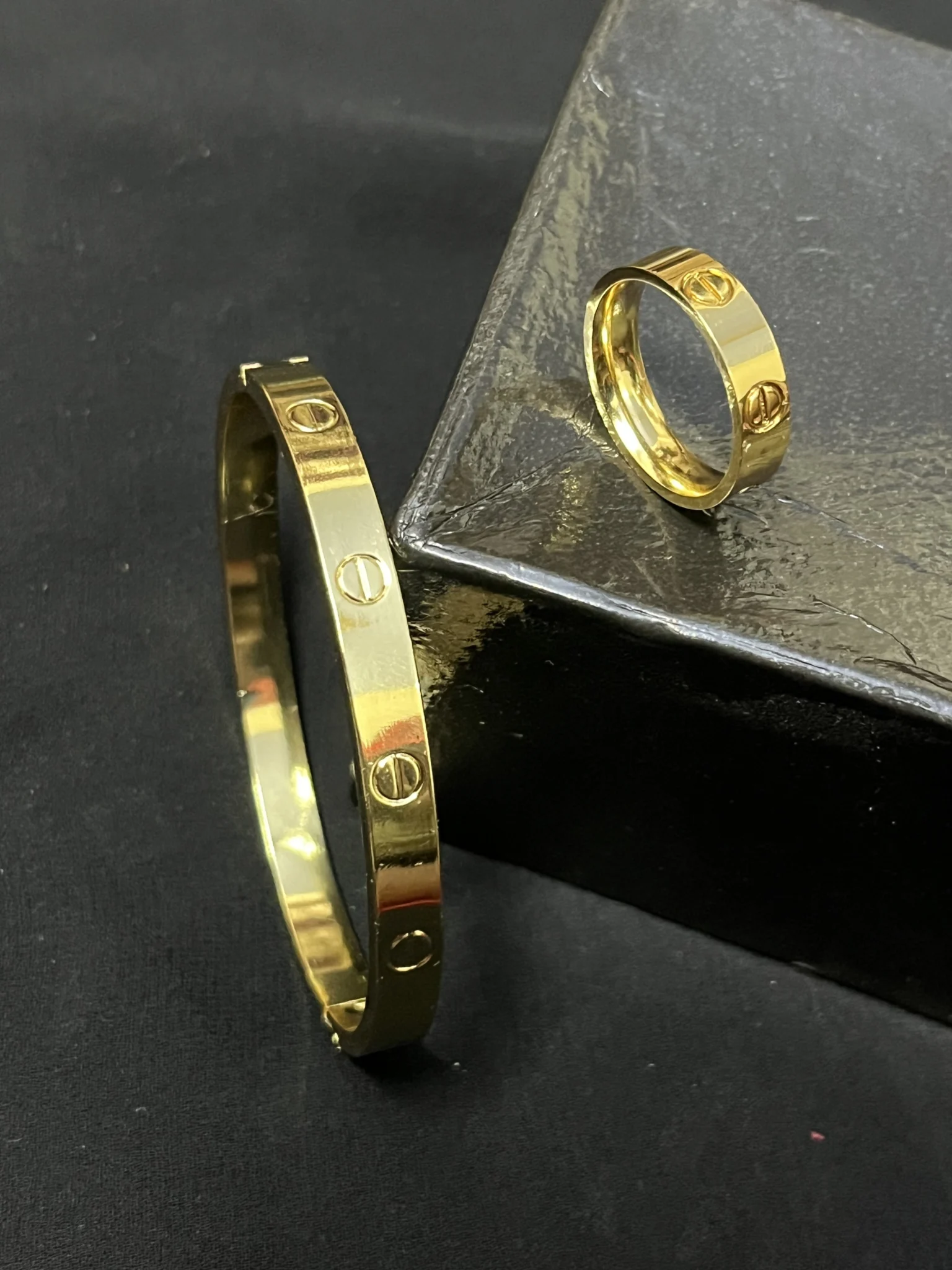 IMG_4265 Elegant Stainless Steel Jewelry Combo for Women | Ring & Bracelet Set - Image 1